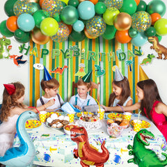 Ouddy Party green dinosaur foil balloon adds jungle charm to the setup.