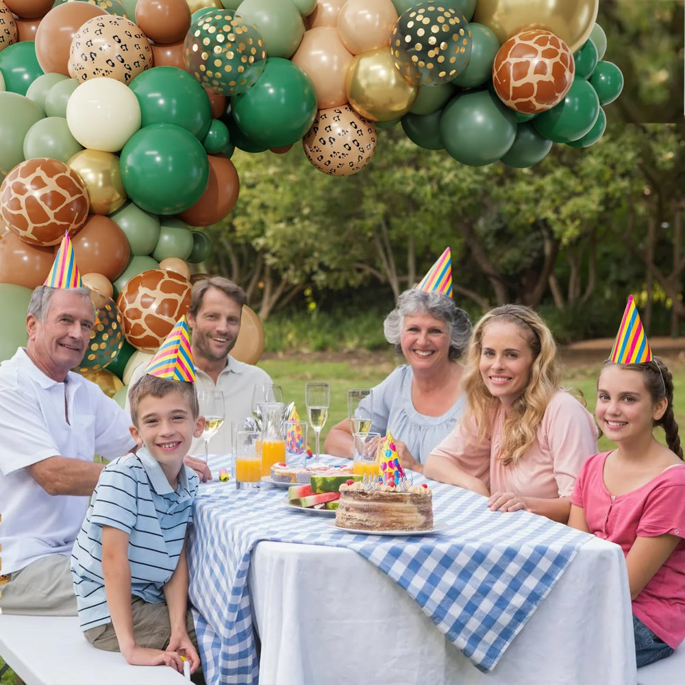 Ouddy Party palm leaves decorate arches with tropical greenery