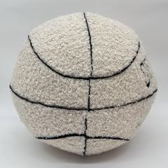 OUKEYI soft plush basketball pillow offers a comfy headrest during movie night.