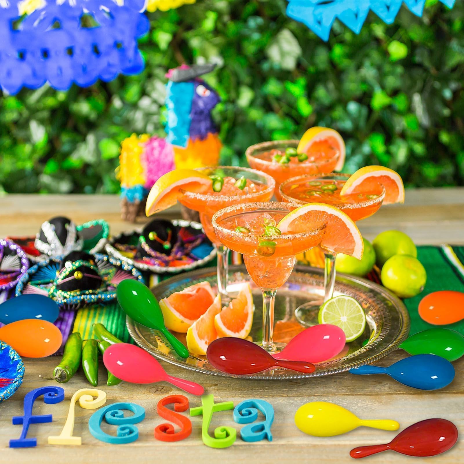 OuMuaMua mini maracas for kids, hand-held and perfect for joyful shakes at celebrations.