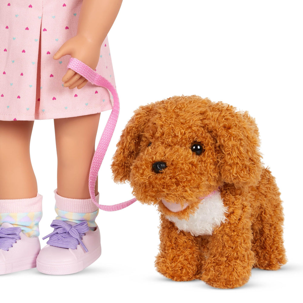 Our Generation water and food bowls enhance pretend meals for dolls.