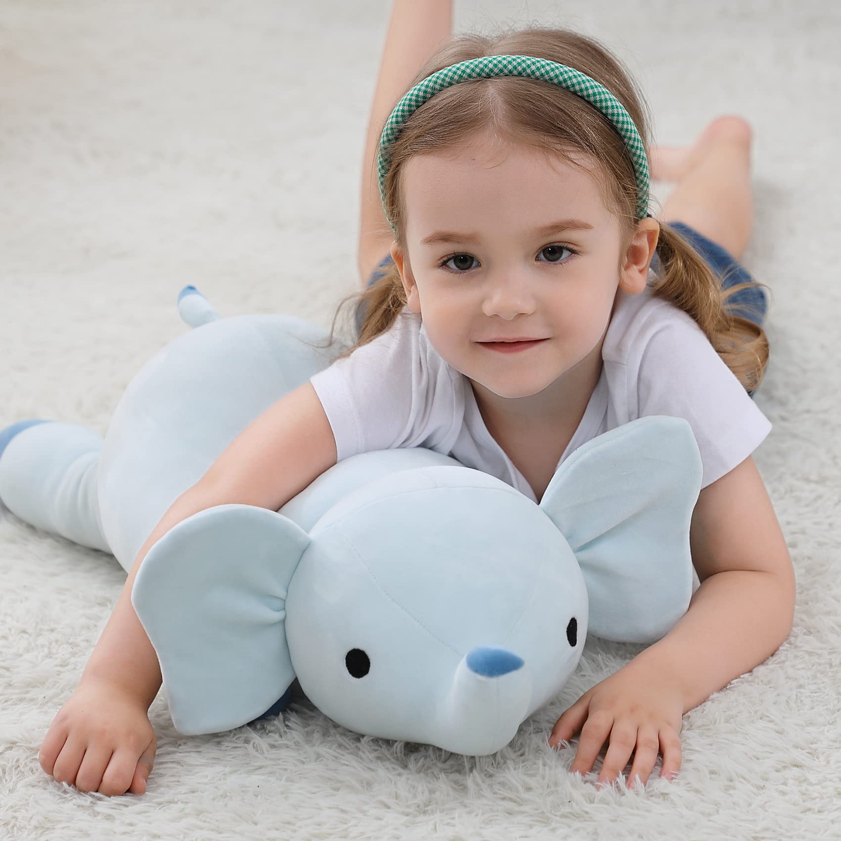 OurHonor plush rests on a bed, ready for hugs and relaxation.