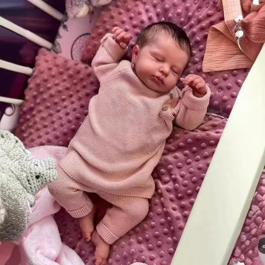 OYESY 20-inch reborn doll showcases sleeping smile perfect for comforting play