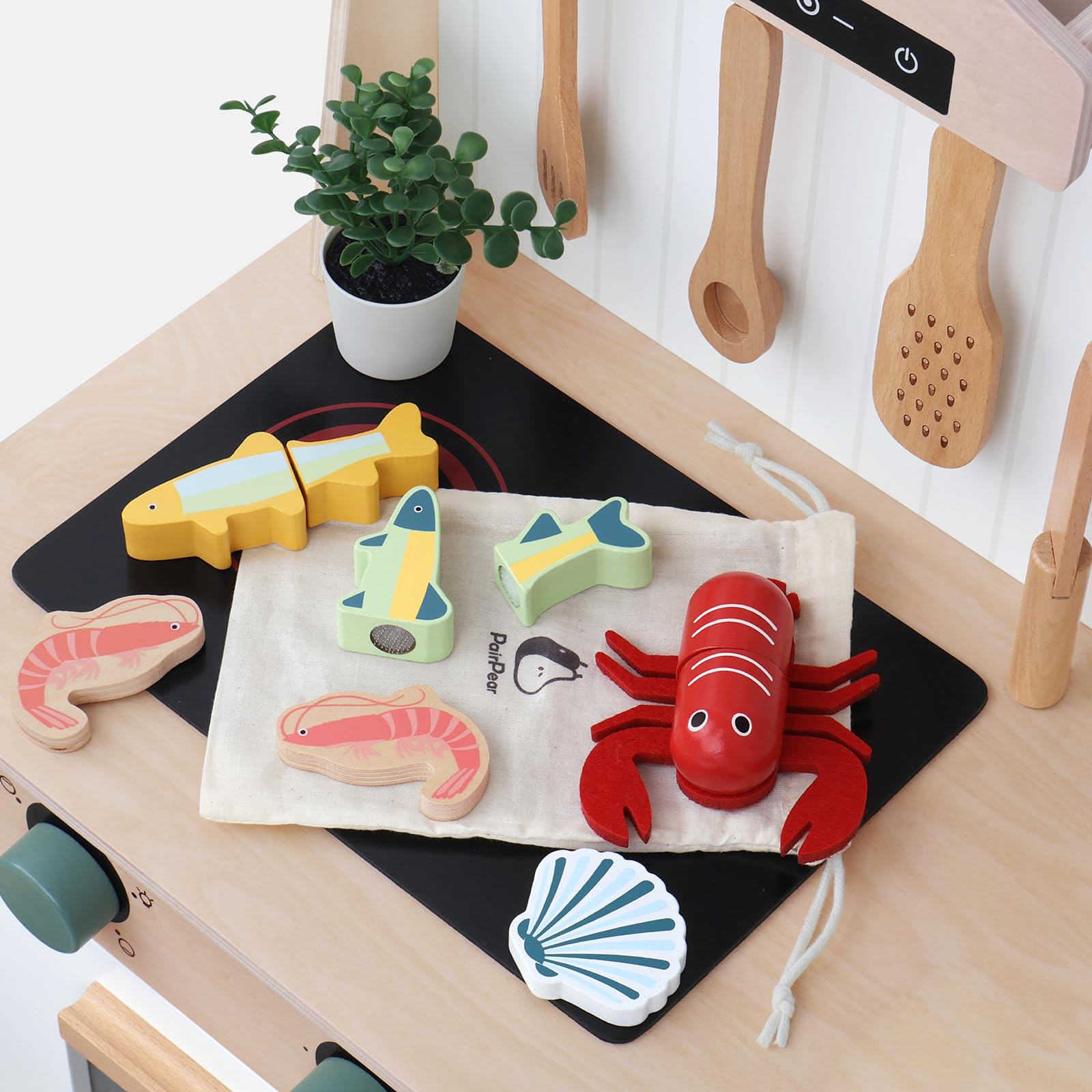 PairPear wooden fish pieces ideal for imaginative kitchen play