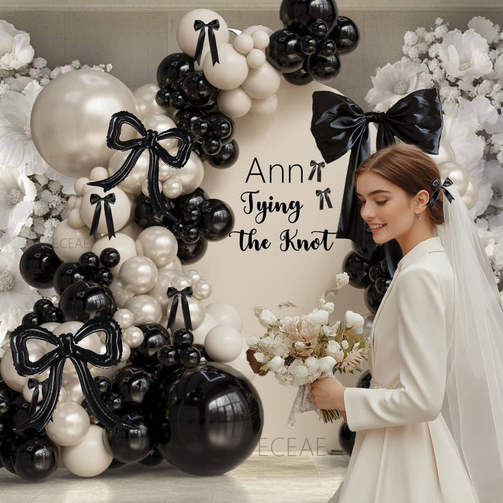 PartyXpress martini decor bow balloons complement chic party themes and photo ops.