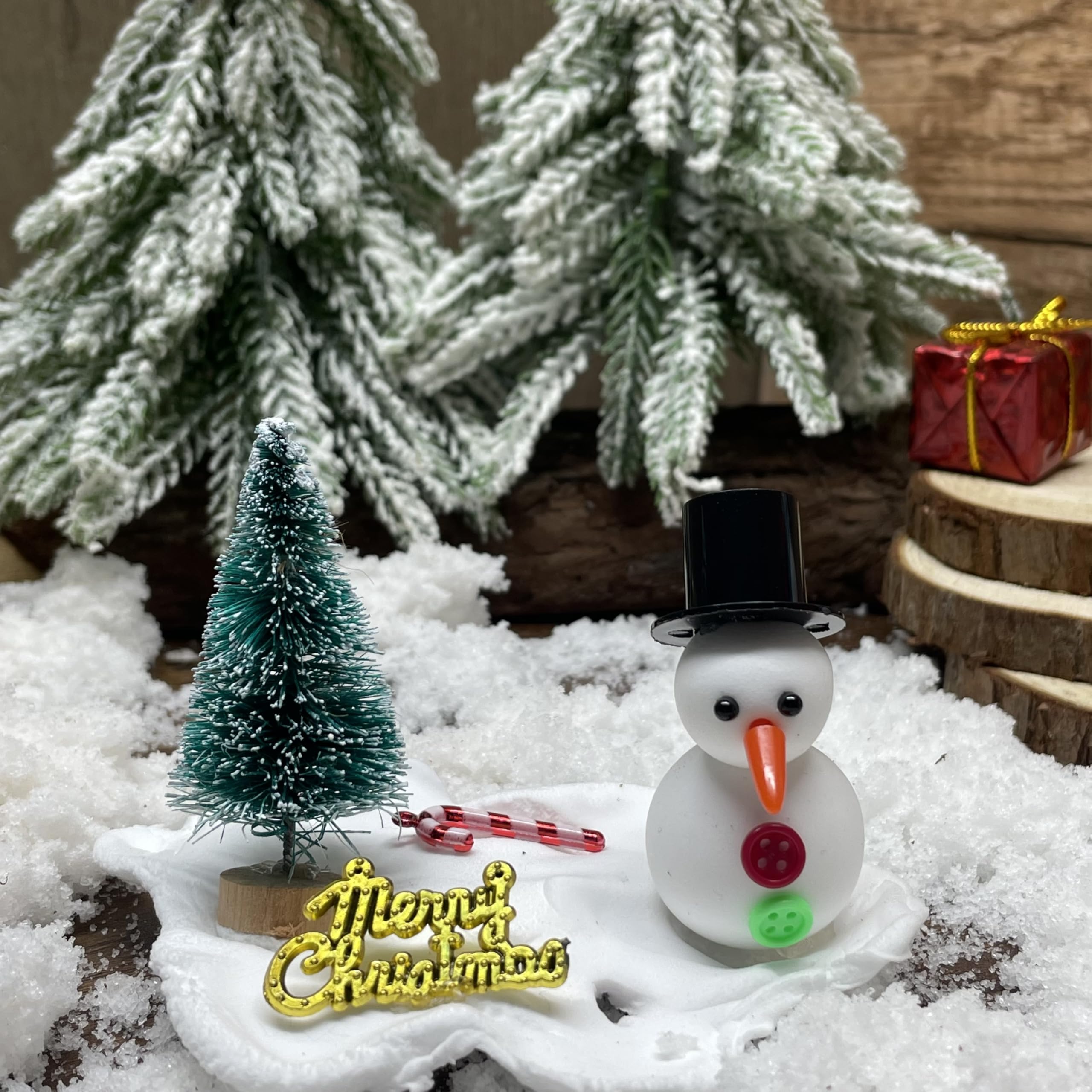 Pastard snowman kit-decorative snowman display of finished art pieces.