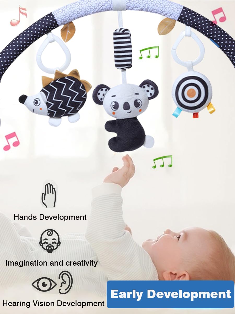 Pau1Hami1ton baby mobile for crib with arc shape aids visual focus.