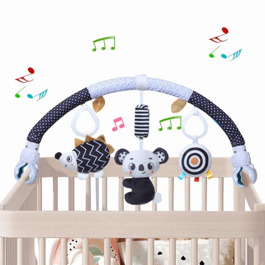 Pau1Hami1ton koala arch toy attached to a stroller for early exploration.