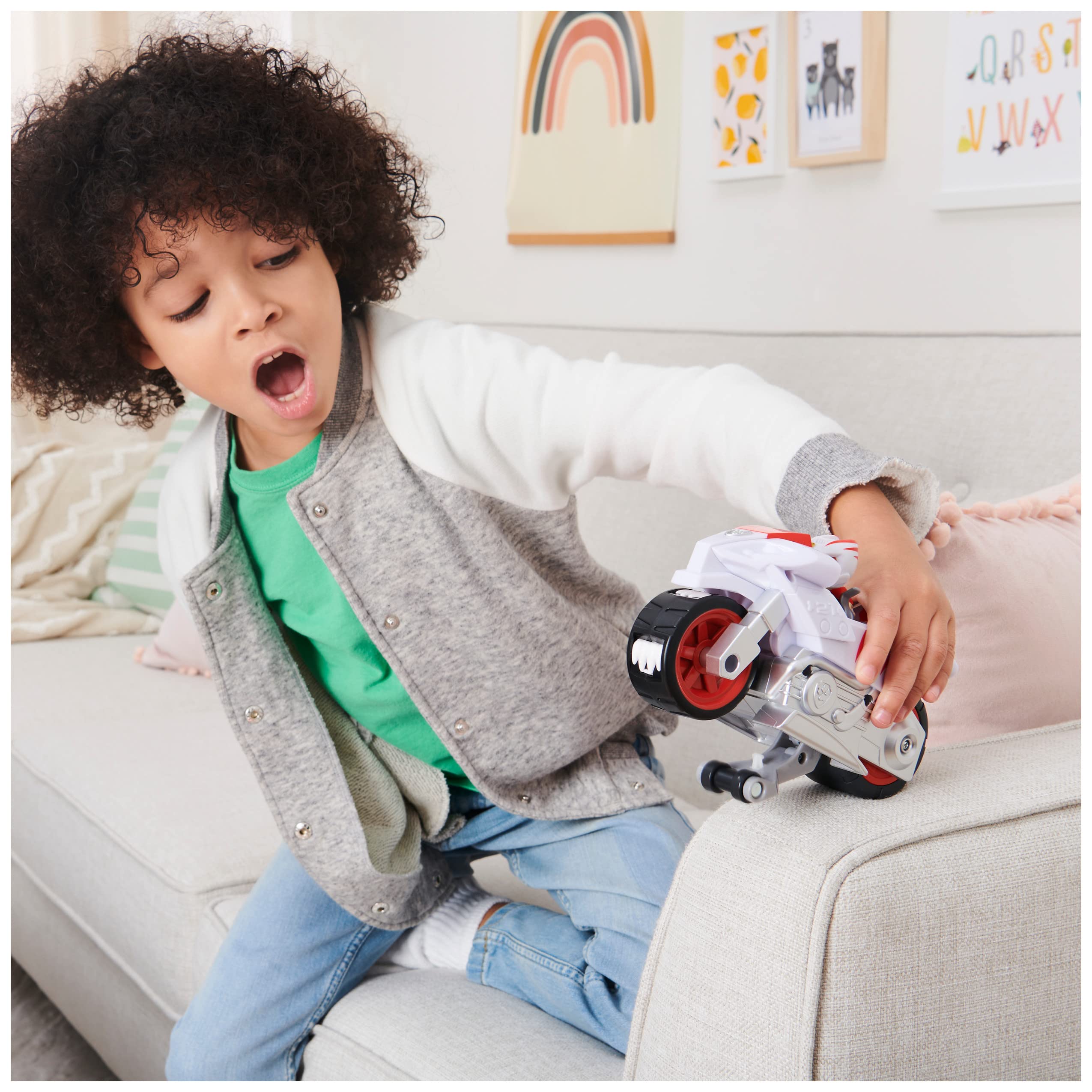 Authentic PAW Patrol graphics and large wheels inspire imaginative missions.