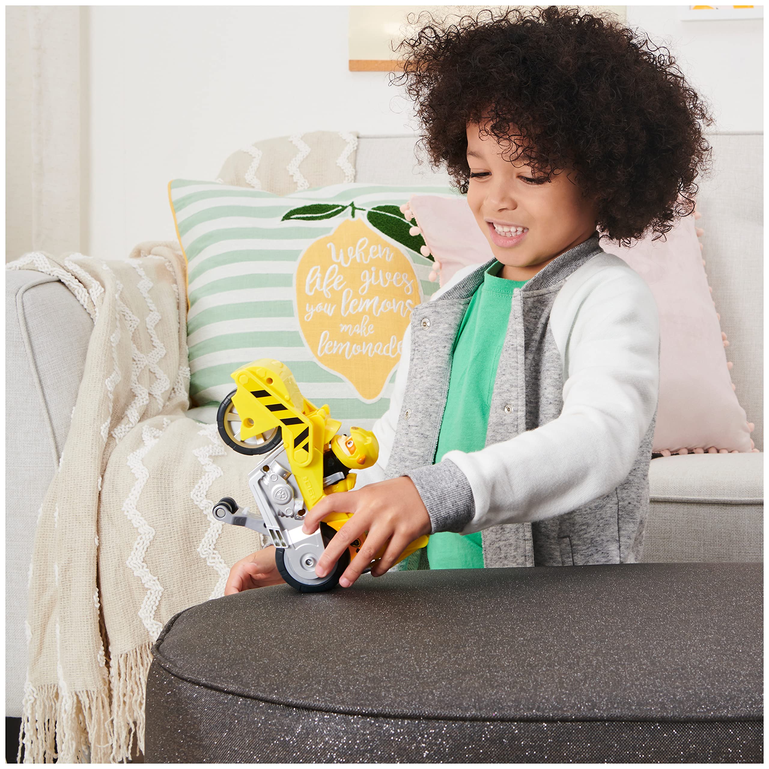 PAW Patrol Rubble figure in jacket and helmet ready for high-speed Moto Pups missions.