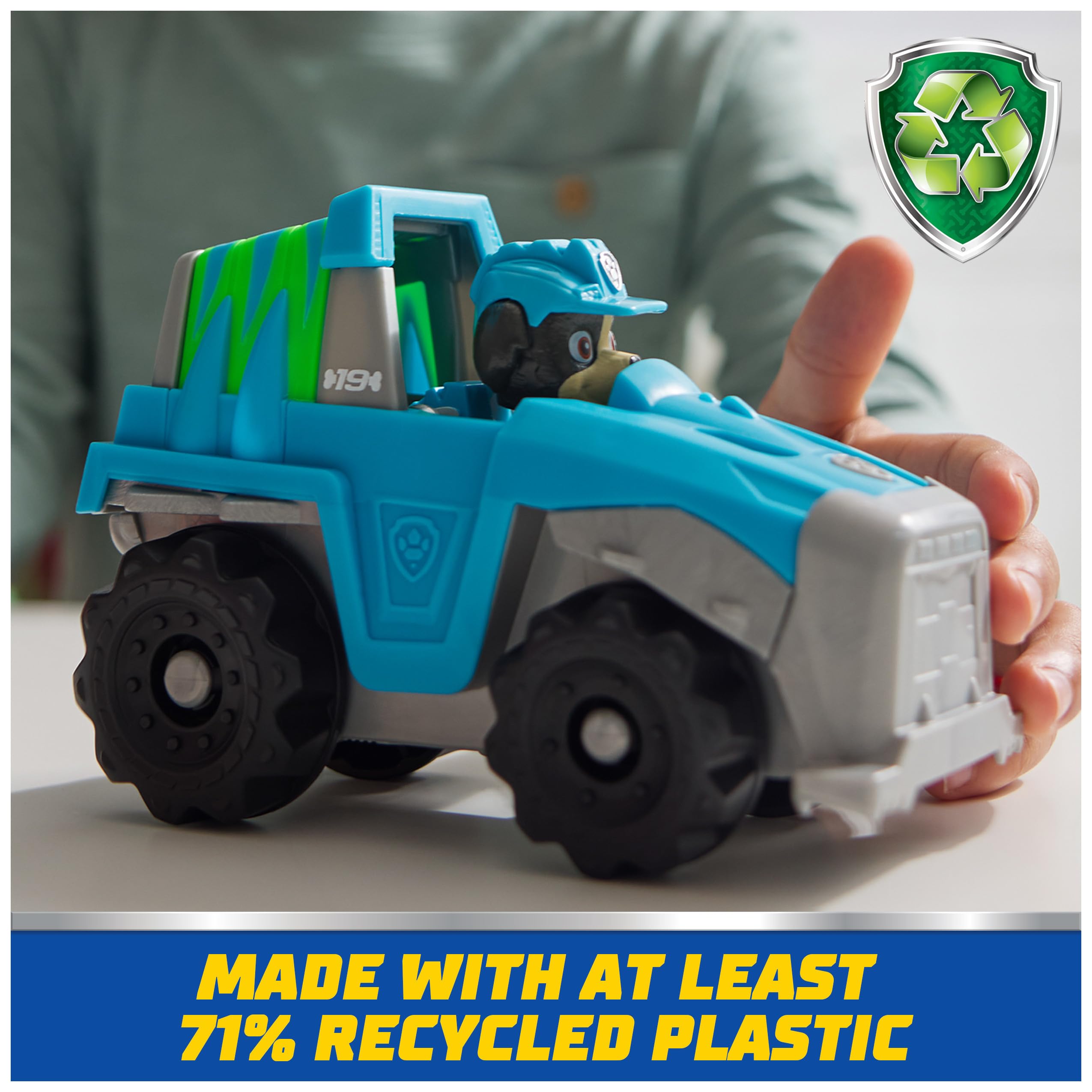 Collectible Rex figure close-up highlighting the mini rescue uniform