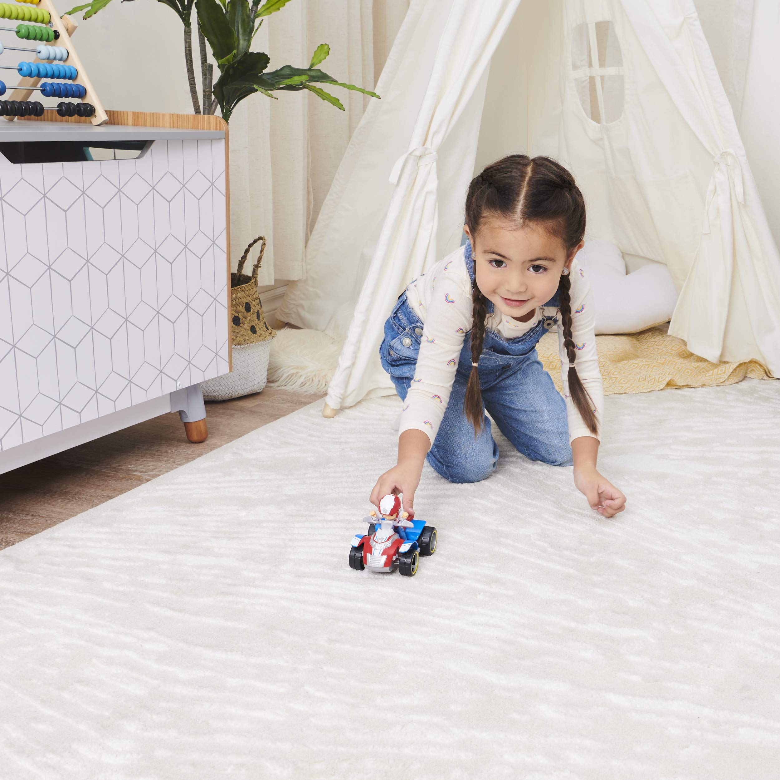 Ryder’s ATV shown with other PAW Patrol vehicles for team adventures.