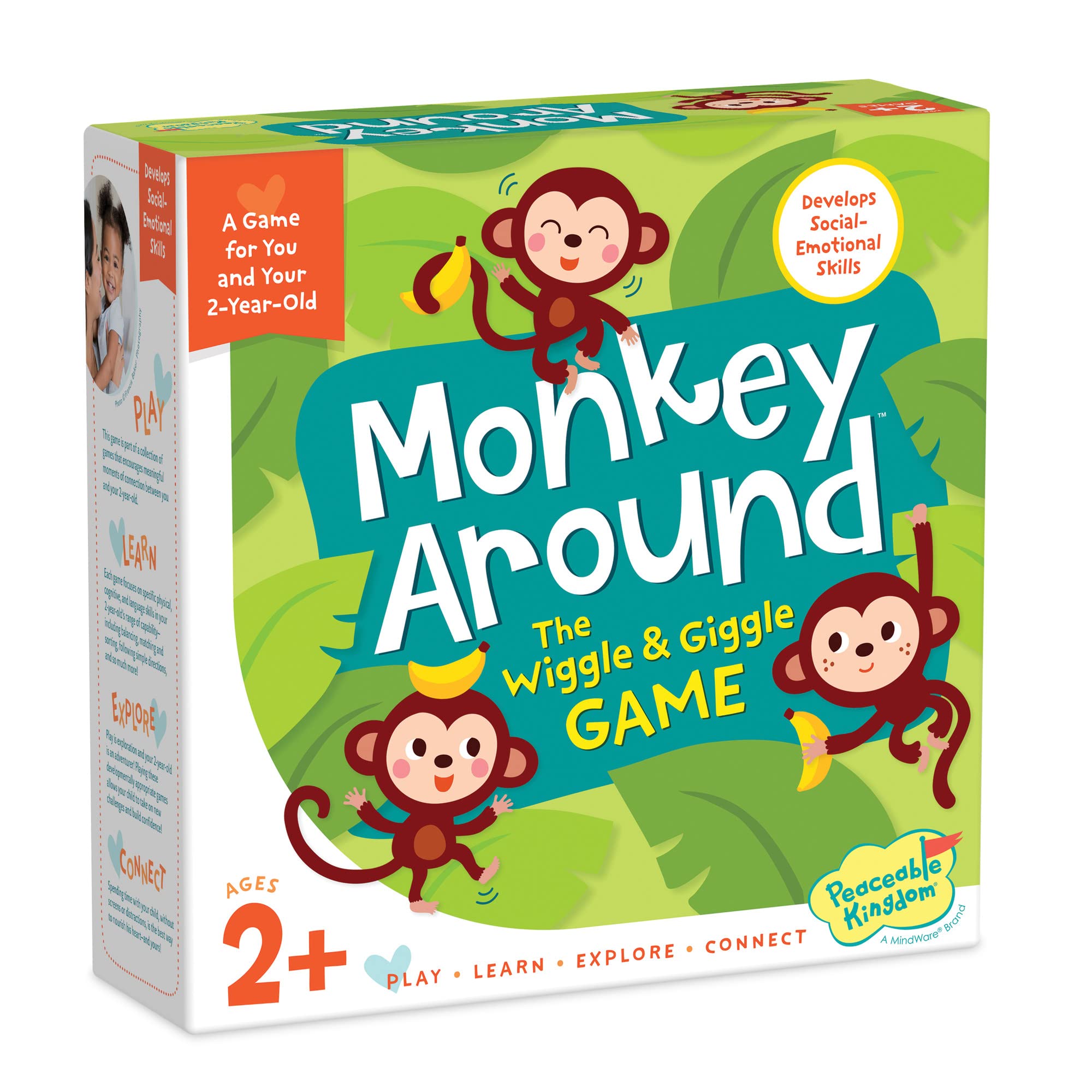 Peaceable Kingdom Monkey Around: toddler uses the banana beanbag for active movement.
