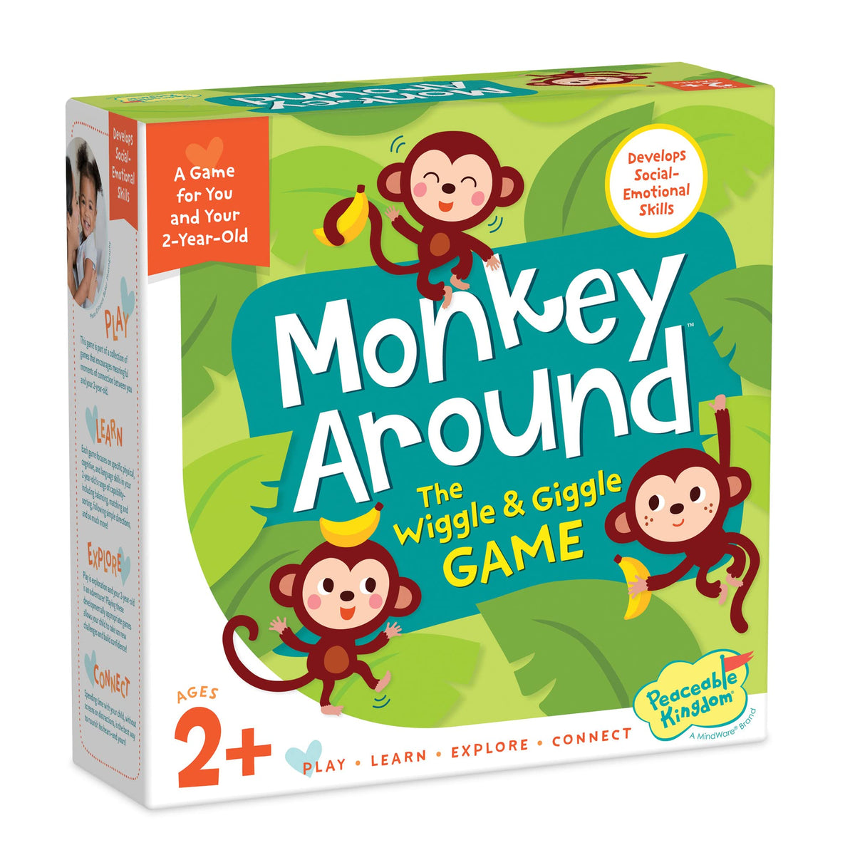Peaceable Kingdom Monkey Around: toddler uses the banana beanbag for active movement.