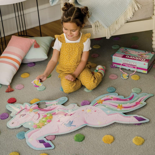 Peaceable Kingdom unicorn floor puzzle carrying case for easy transport.