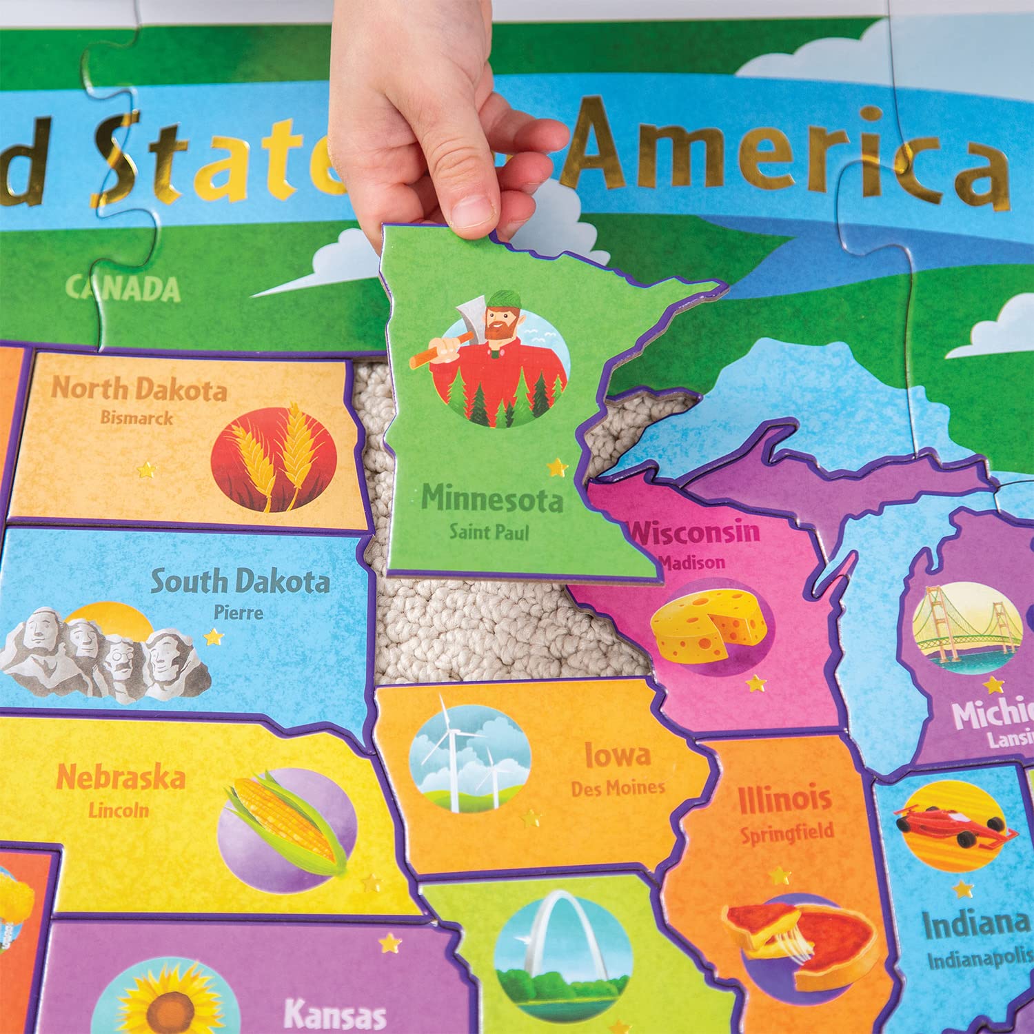 Peaceable Kingdom USA puzzle symbols help kids connect states to unique traits.