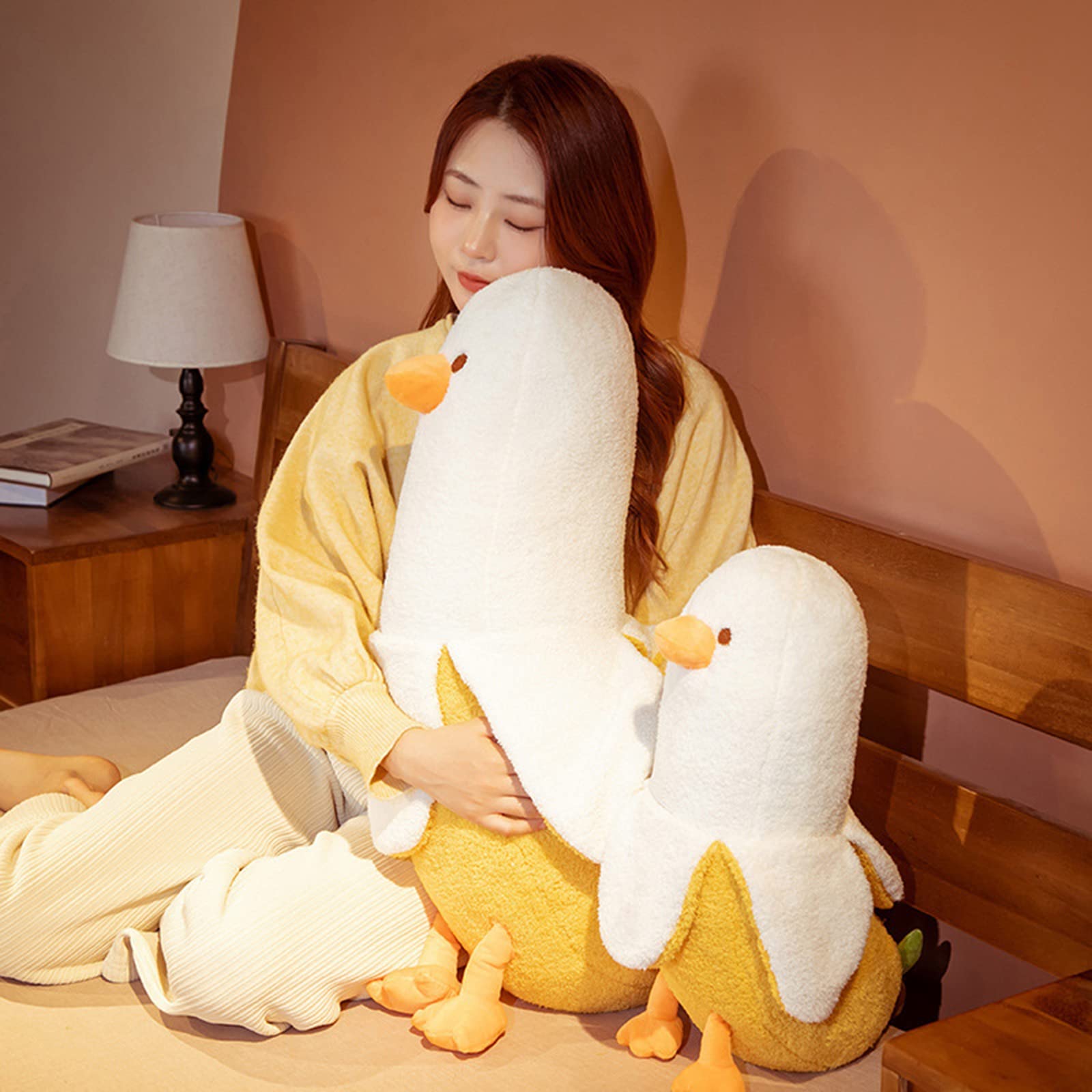 PEACH CAT banana duck plush in a cozy room setup inviting play and rest.