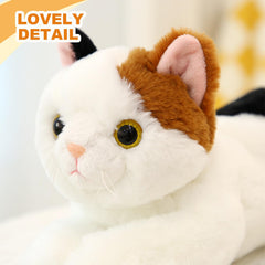 PEACH CAT Calico Cat Plush in a cozy reading nook, ideal for kids and adults.