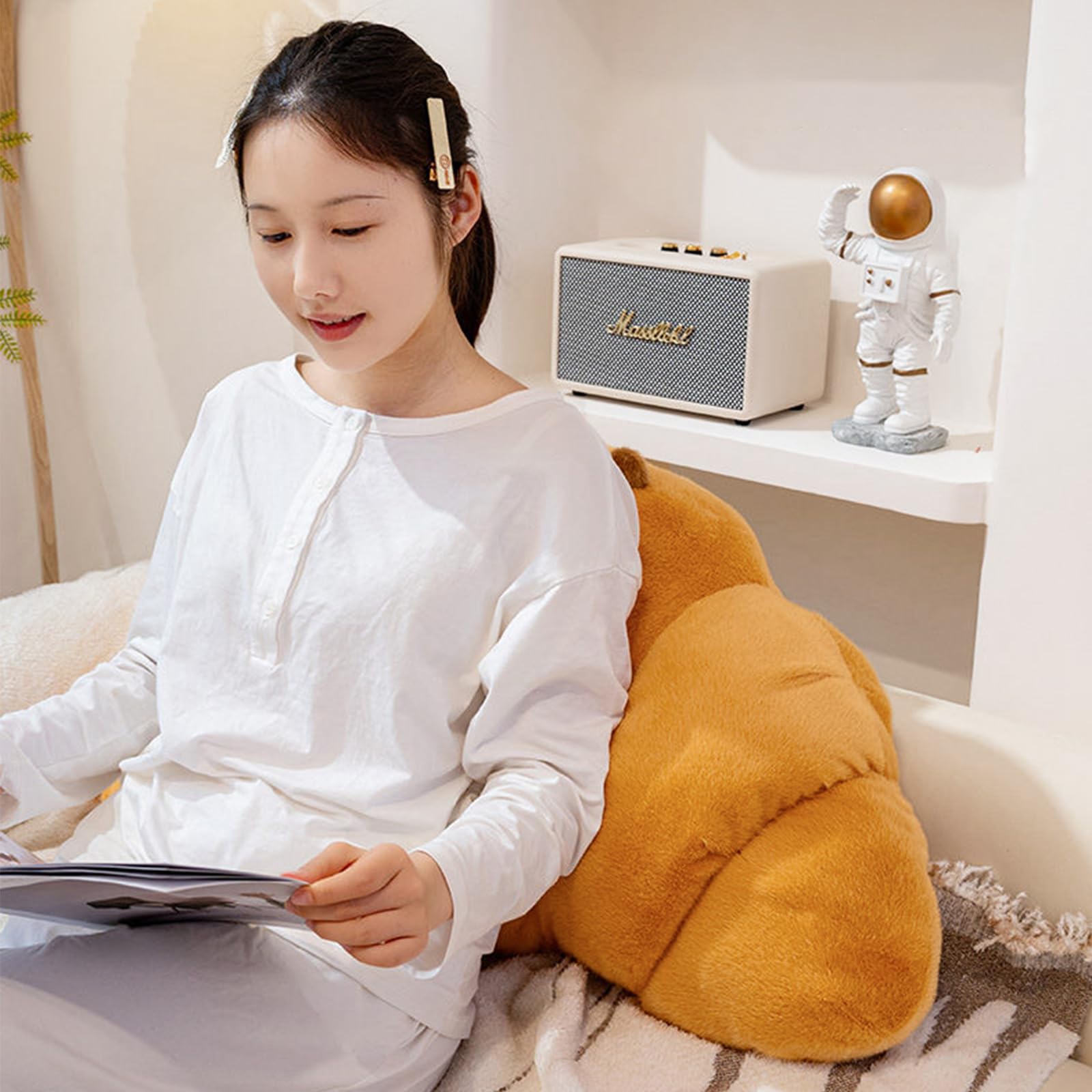 PEACH CAT croissant capybara plush, nap-ready pose, a comforting companion for lounging.