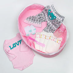 Pedolltree pink bodysuit with accessories offers versatile styling options.