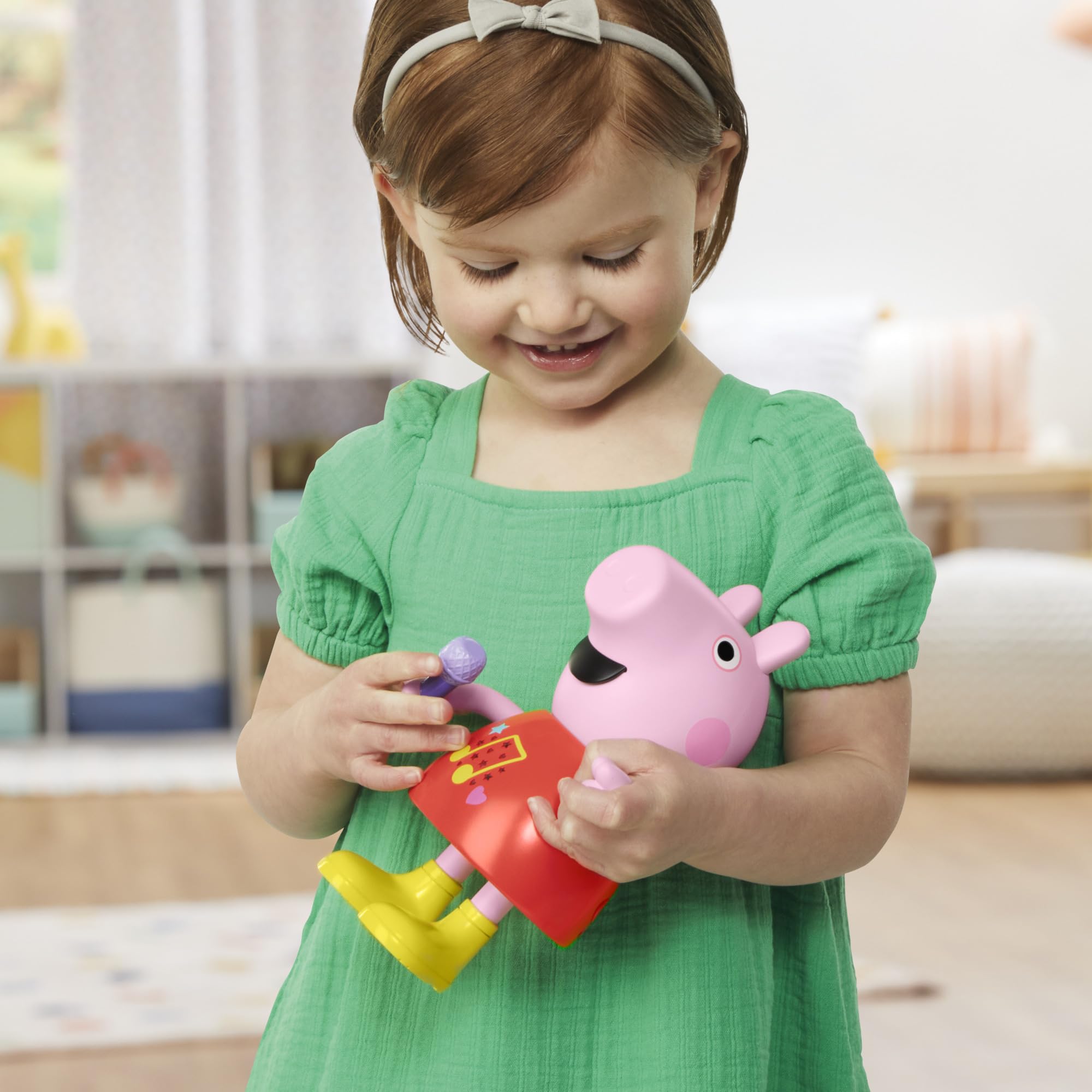 Soft plush body of Peppa Pig Talk & Sing doll for cuddly play