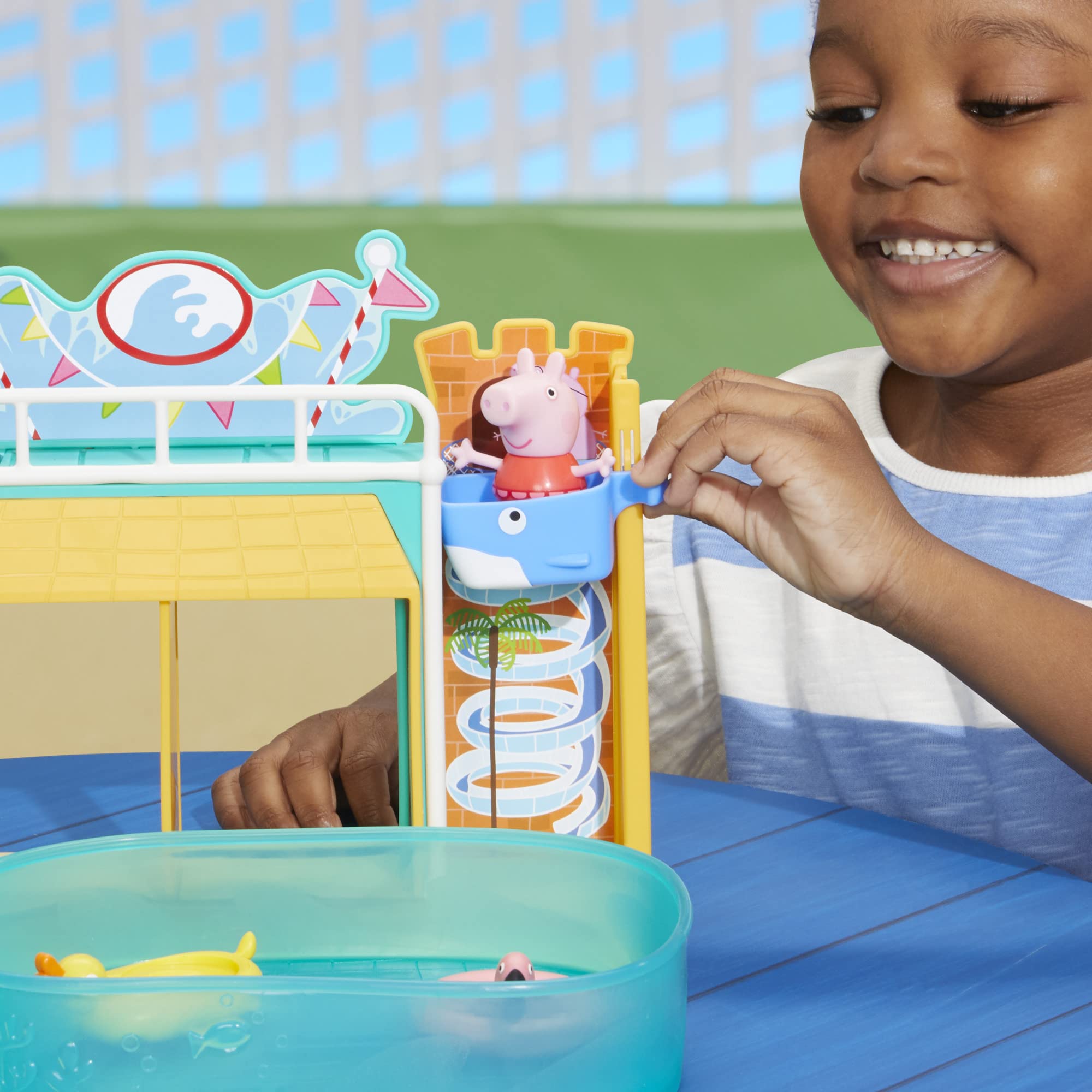 Peppa Pig Waterpark pool deck setting encourages social play and shared role-play.