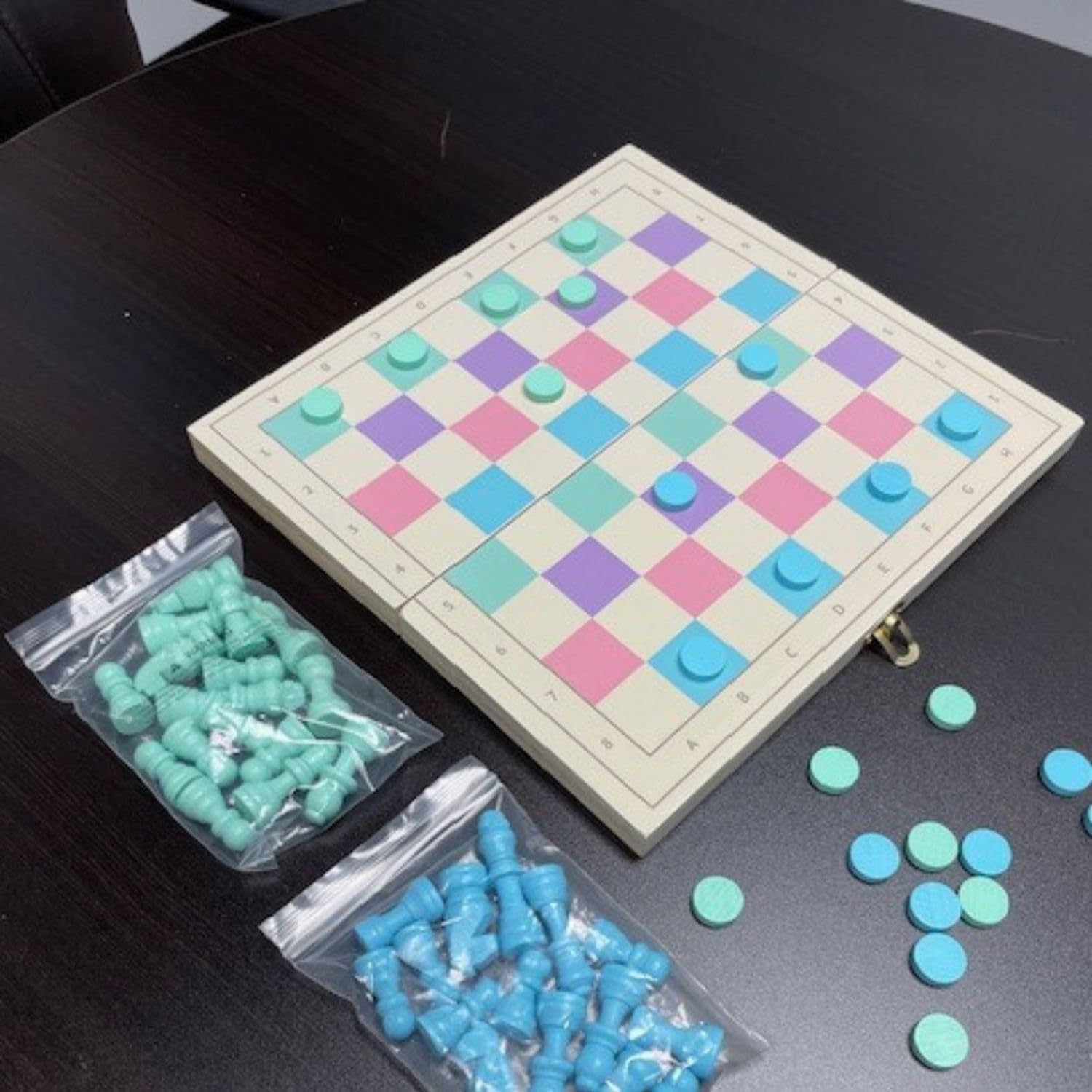 Colorful checkers pieces on the board designed for easy identification