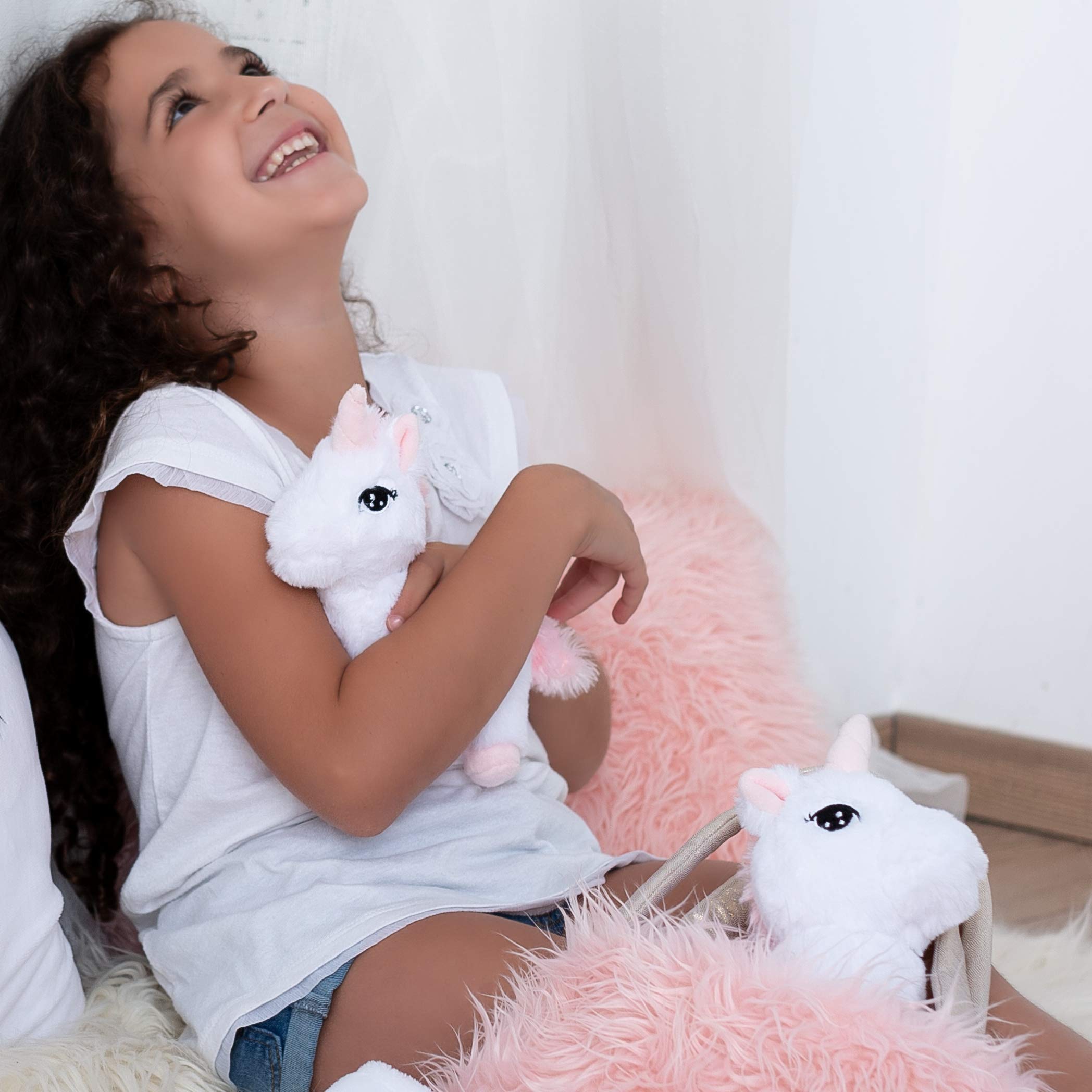 Perfectto Design pink furry purse doubles as a playful unicorn bag