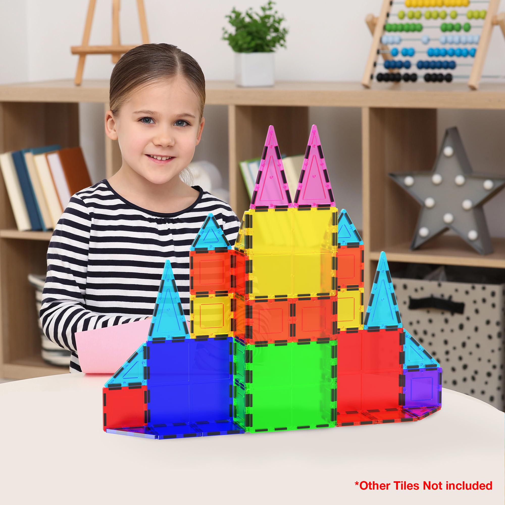 PicassoTiles kid building massive structure promotes spatial reasoning and imagination