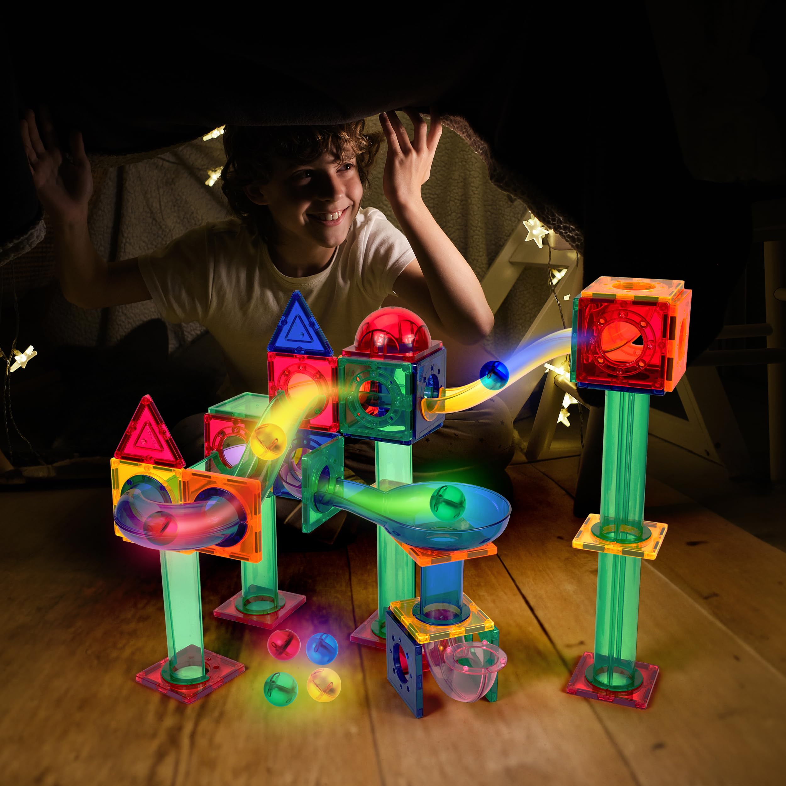 PicassoTiles LED marbles light up on the track, boosting visual tracking during play.