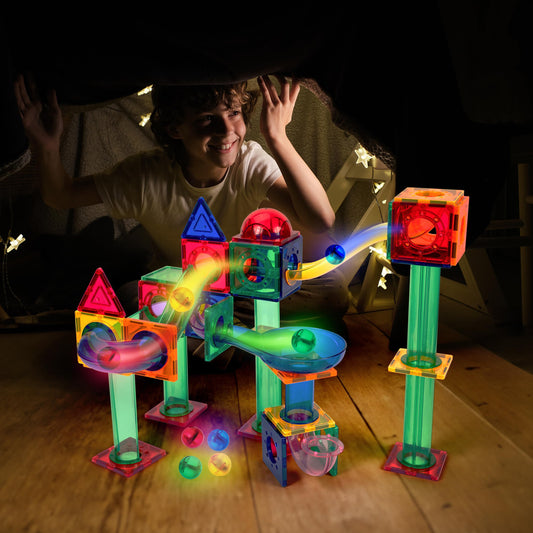 PicassoTiles LED marbles light up on the track, boosting visual tracking during play.