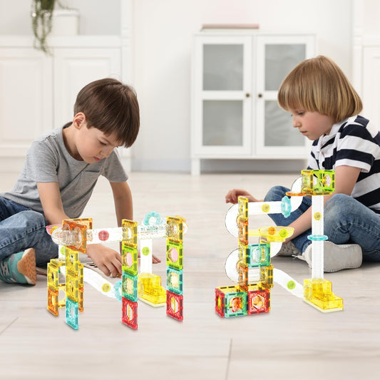PicassoTiles magnetic tiles with launcher demonstrate quick marble launches and endless track-building possibilities.