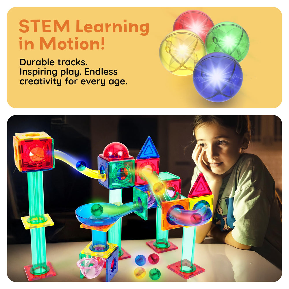 PicassoTiles STEM toy marbles support early color and geometry exploration during group activities.