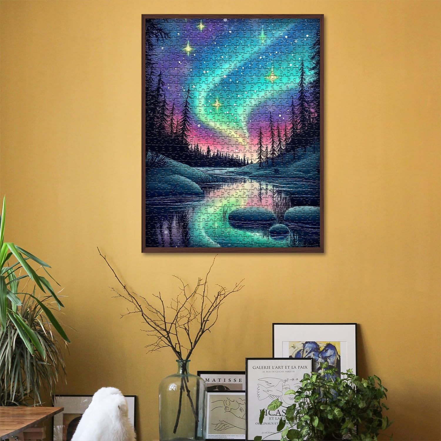 PICKFORU lake-and-aurora scene reflects softly on water.
