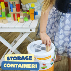 Pidoko Kids child stacks blocks to build towers and practice balance and coordination.