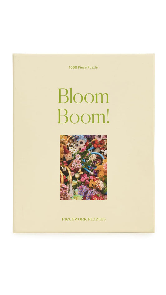 Piecework Bloom Boom floral puzzle box captures vibrant blooms for a challenging, satisfying at-home jigsaw