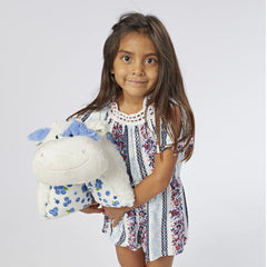 Pillow Pets Blueberry Cow snuggling with a child, comforting bedtime companion