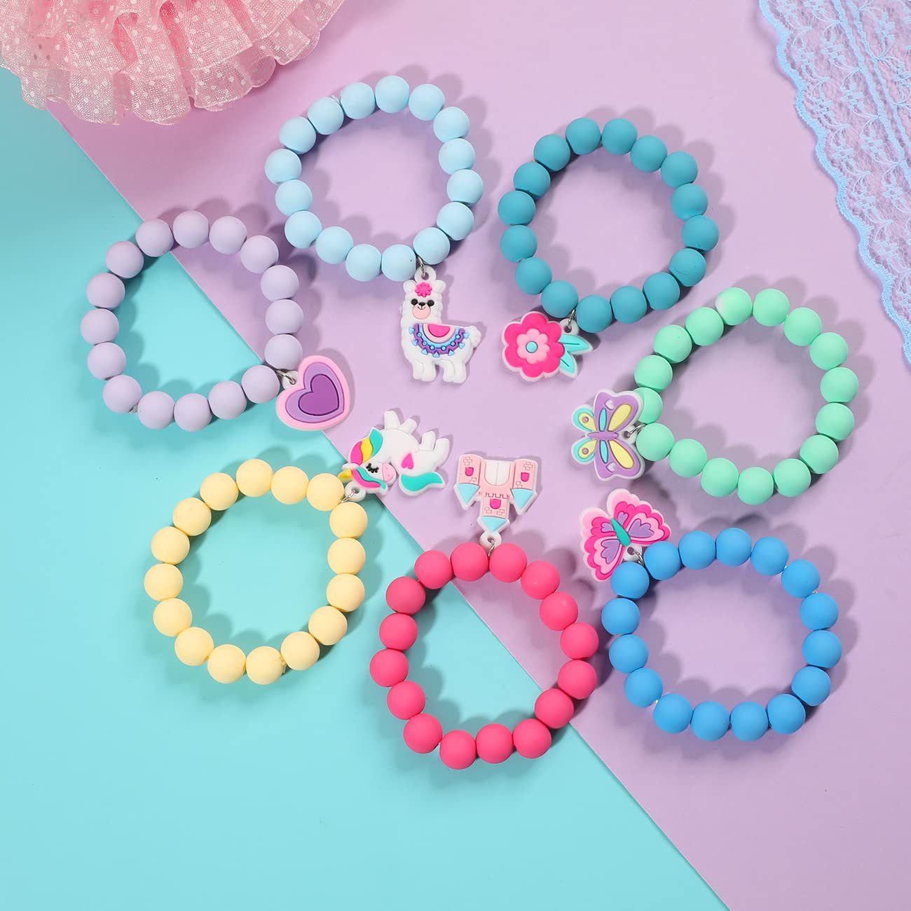 PinkSheep rainbow bracelet featuring unicorn pendant for gifting.