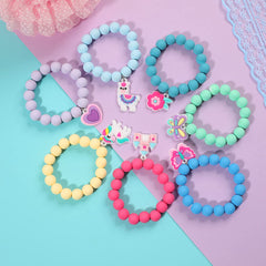 PinkSheep rainbow bracelet featuring unicorn pendant for gifting.