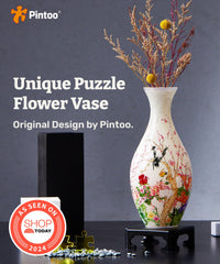 Pintoo vase with detachable water cup for easy refilling and cleaning.