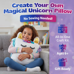 Pinwheel Crafts Unicorn Pillow Kit supplies in box, including stuffing and decorations.