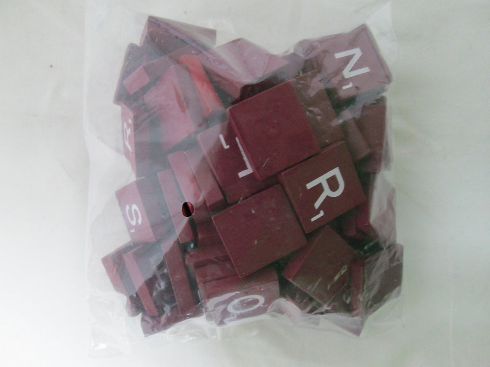 Planet Xpress maroon tiles with white letters, ideal for crafts and messages.