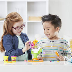 Two characters sit for interactive pretend grooming with Play-Doh.