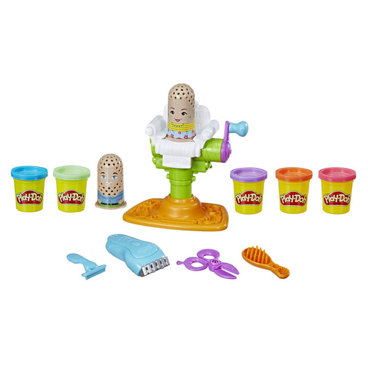 Play-Doh Buzz 'n Cut electric buzzer sound enhances pretend grooming.