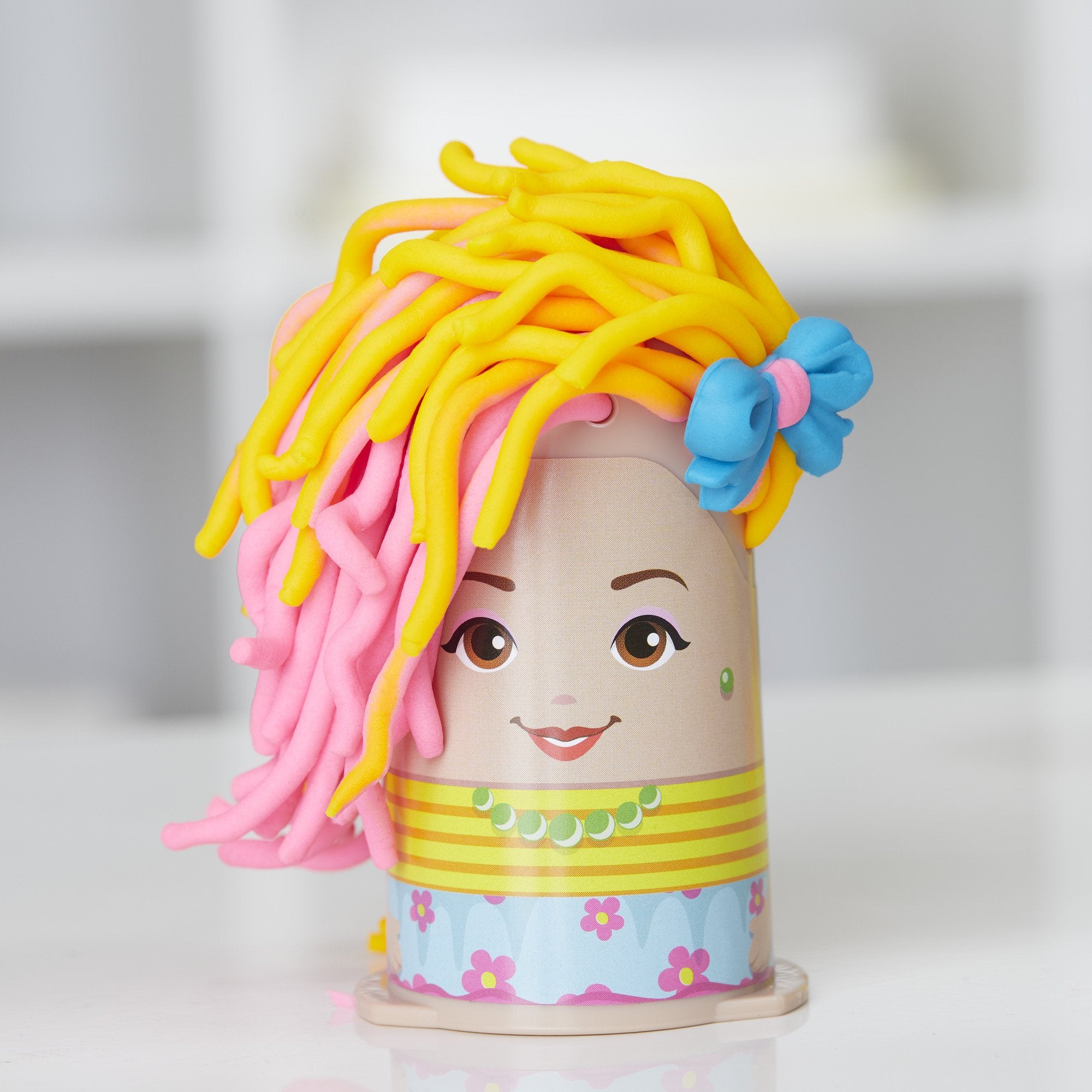 Razor and tools included for authentic barber play with Play-Doh.