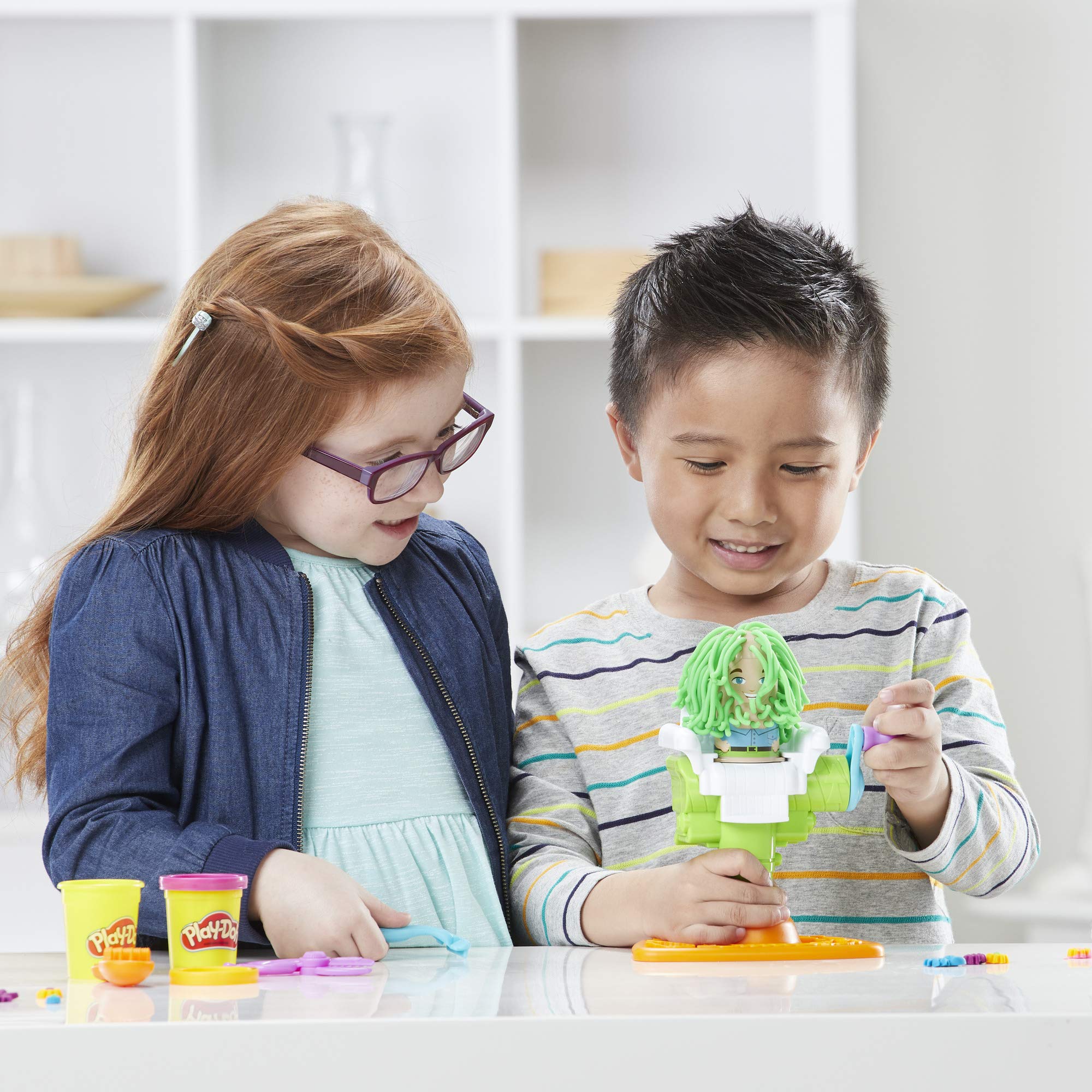 Beard styling with Play-Doh Buzz 'n Cut adds silly facial hair options.
