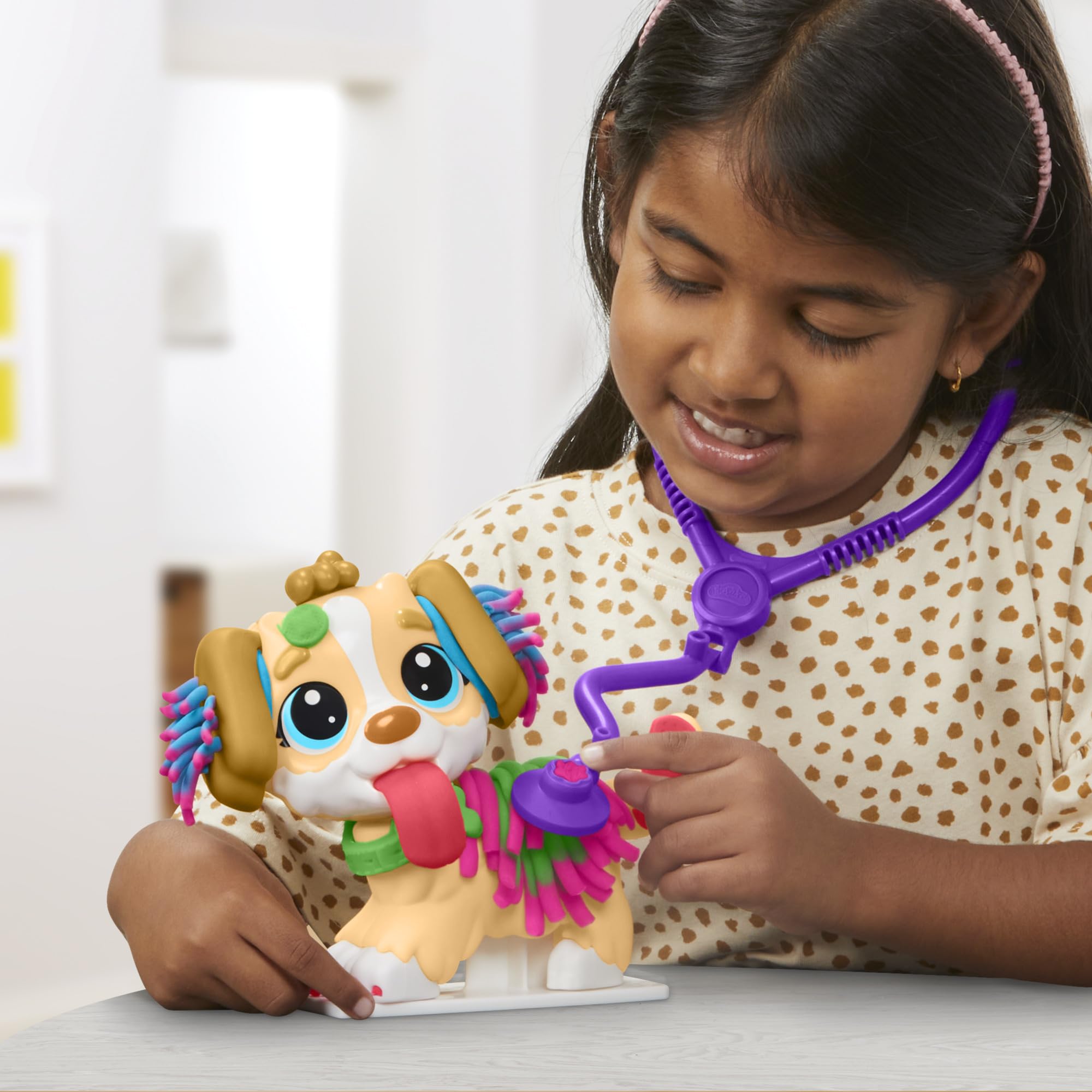 Play-Doh Care 'n Carry color cans for creative modeling.