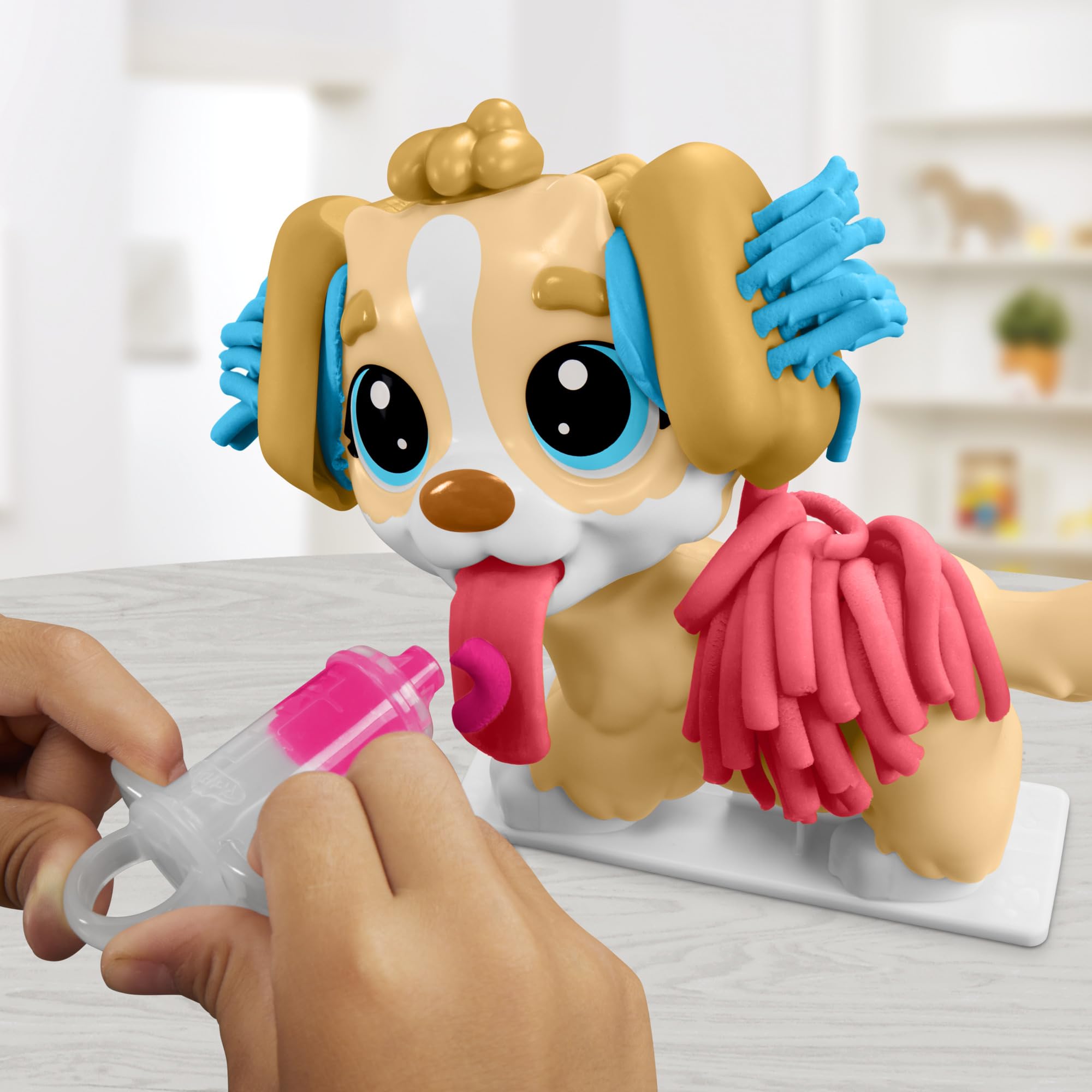 Play-Doh Care 'n Carry play scissors for grooming fun.