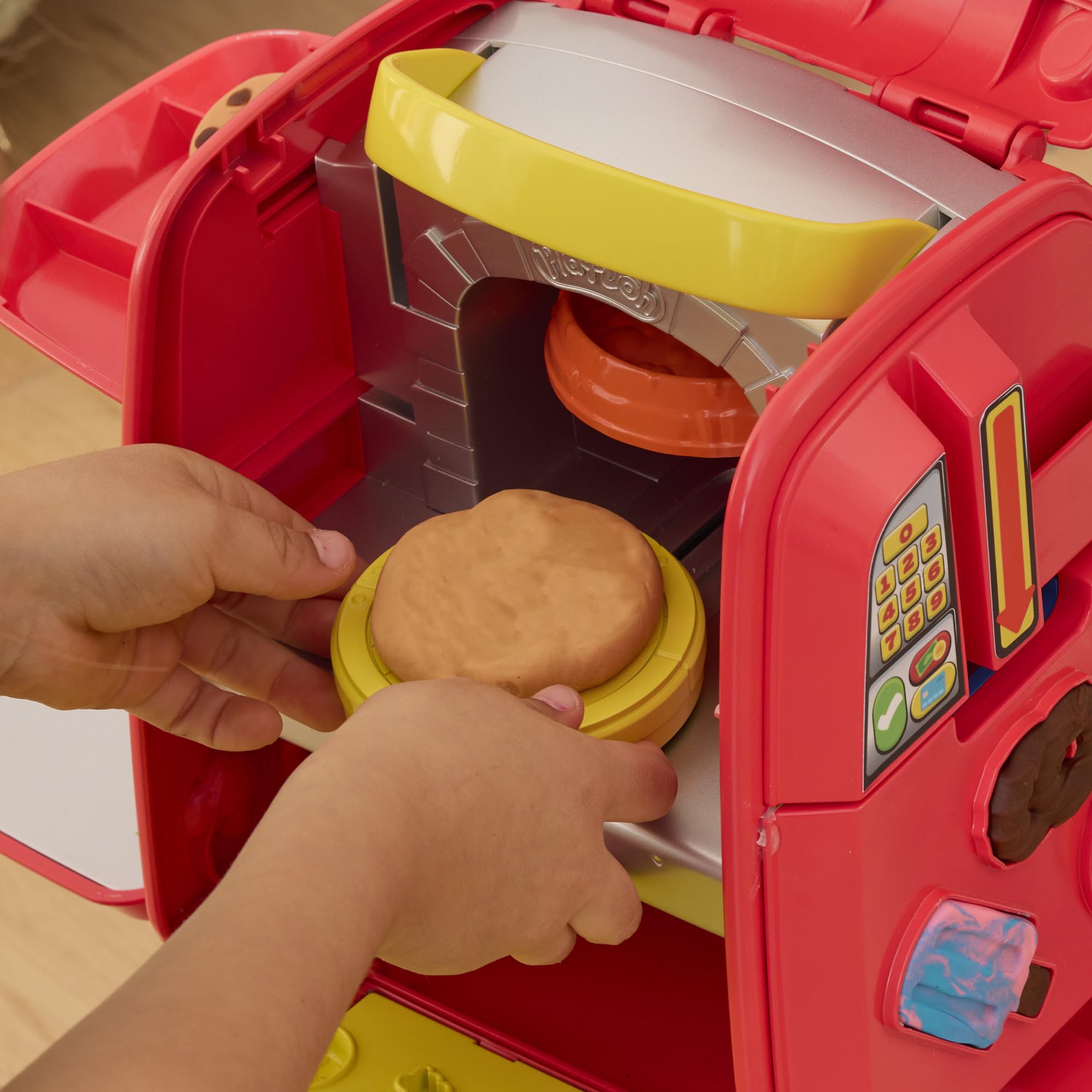 Kids age 3 to 5 enjoying Play-Doh Pizza Delivery Scooter