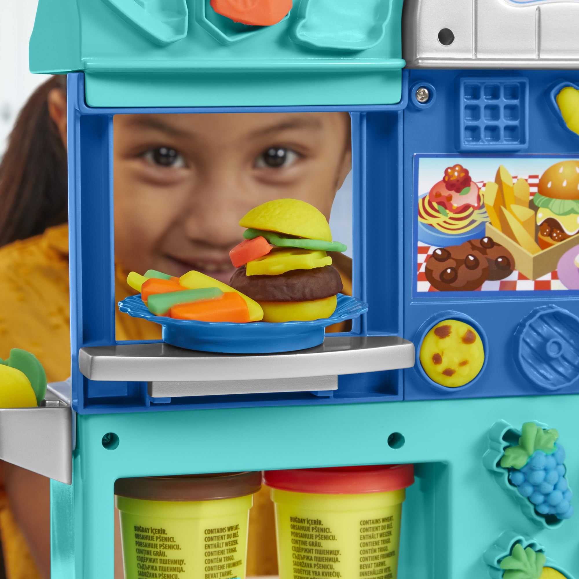 Play-Doh Kitchen Creations Busy Chef's Restaurant Playset half-molds add toppings and sides for playful menus.
